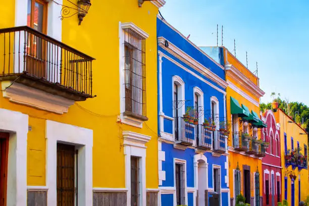 Streets of the center of the city of Puebla, various facades with bright colors and beautiful views.