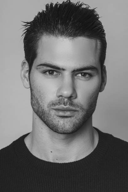istock Black and White Young Man Portrait 1190286719