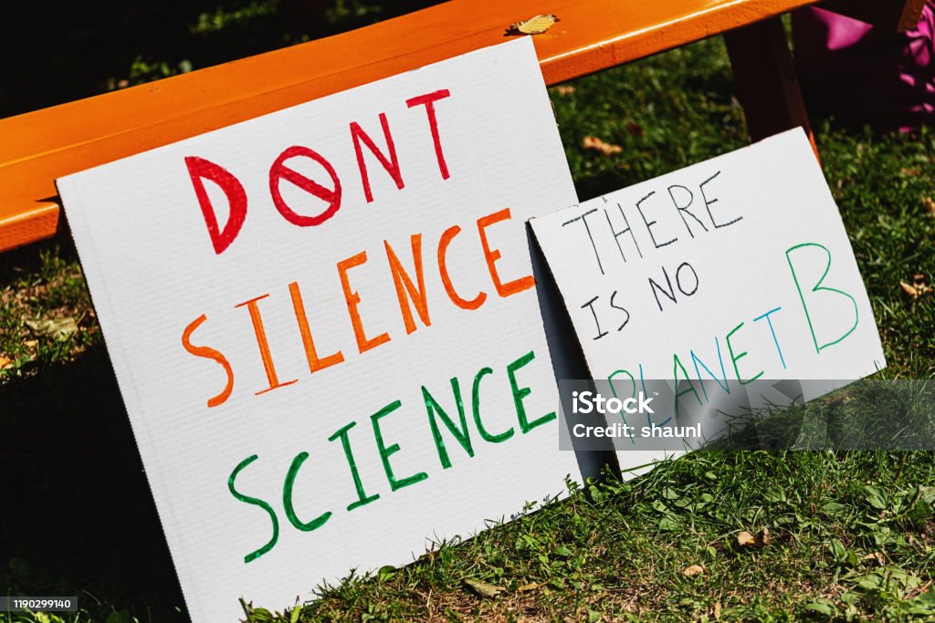 Climate Change Protest Climate change signs of protest. Politics Stock Photo
