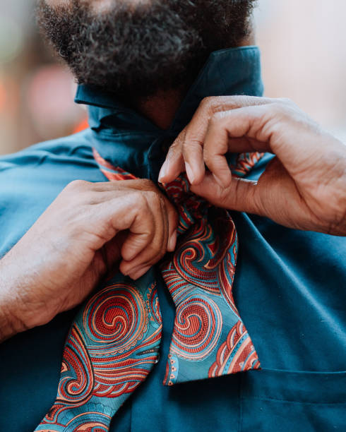istock African American man fixing his bow tie 1190300312