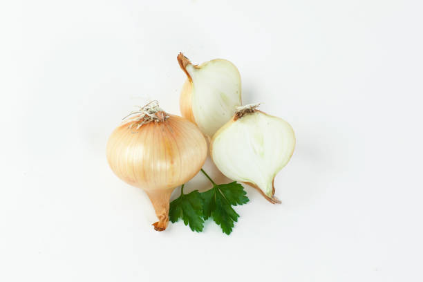 istock fresh Golden onions.isolated on a white background 1190300990