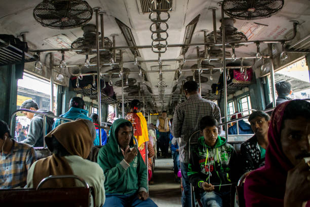Passengers Inside Local Train of Indian Railway Kolkata, India - December 17, 2018: Middle class passengers inside Indian Railway local train Kolkata, India. Indian Railways carries about 7,500 million passengers annually. electric train photos stock pictures, royalty-free photos & images