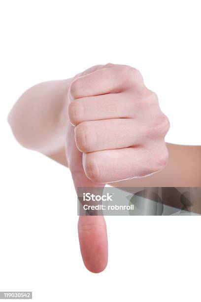 Hand Signaling Daumen Nach Unten Vor Einem Weißen Hintergrund Stockfoto und mehr Bilder von Daumen