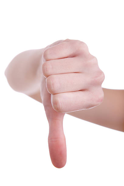 istock hand signaling thumb down against a white background 119030542