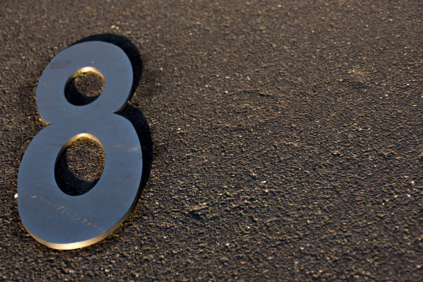 istock Metal numbers in the ground 1190320777