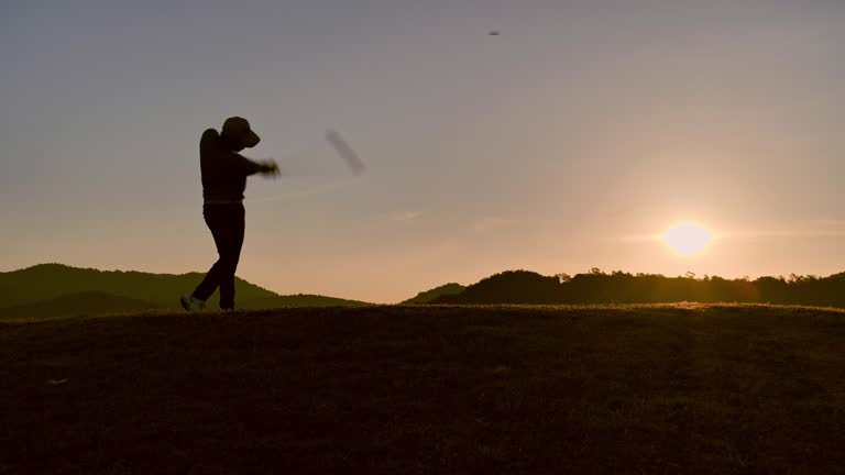 Golfers hit sweeping in the summer for relax time, sport concept.
