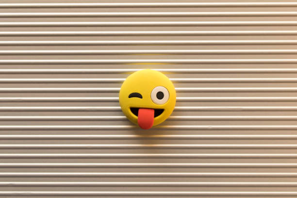 istock Funny smiley face on silver background. Positive mood concept. 1190324518