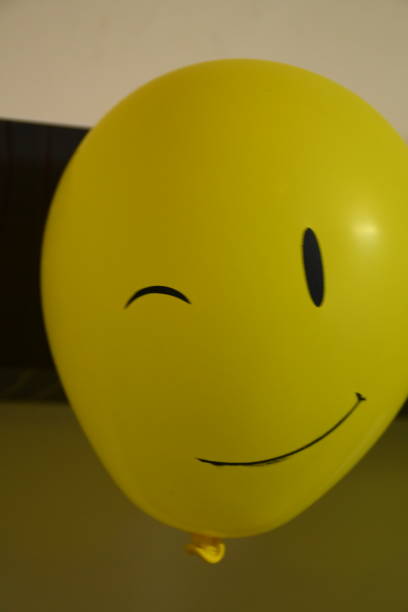 istock Different types of emoji faces on balloons 1190324689