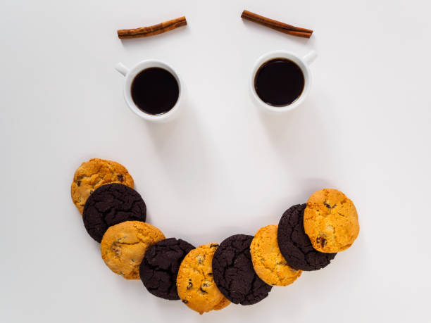 istock Smile on the table of products. Coffee, biscuits and cinnamon 1190324705