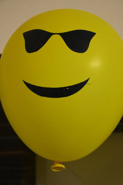istock Different types of emoji faces on balloons 1190324735