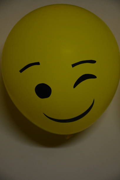 istock Different types of emoji faces on balloons 1190324768