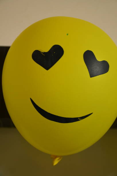 istock Different types of emoji faces on balloons 1190324769