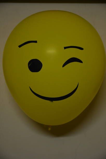 istock Different types of emoji faces on balloons 1190325285