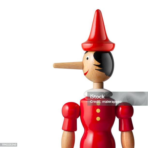 Lie Pinocchio Stock Photo - Download Image Now - Pinocchio, Toy, Red