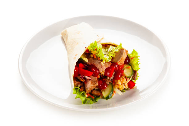 istock Kebab - grilled meat and vegetables on white background 1190328859
