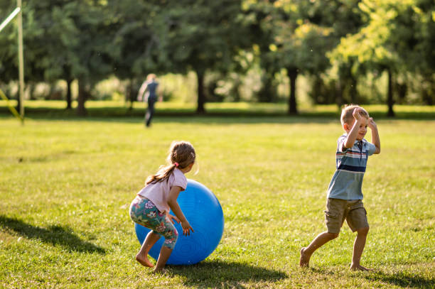 istock Children playing in public park 1190328877