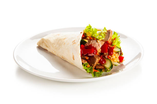 istock Kebab - grilled meat and vegetables on white background 1190328889