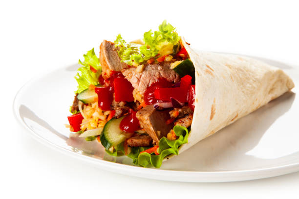 istock Kebab - grilled meat and vegetables on white background 1190328952