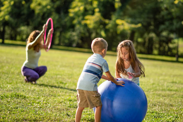 istock Children playing in public park 1190328954