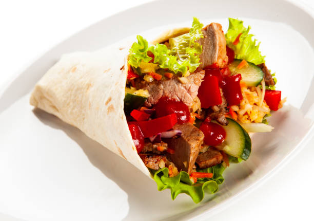 istock Kebab - grilled meat and vegetables on white background 1190328965