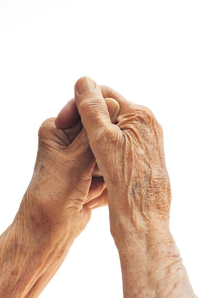 Senior woman's hands isolated on white stock photo