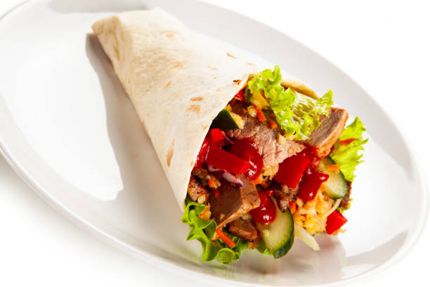 istock Kebab - grilled meat and vegetables on white background 1190329477