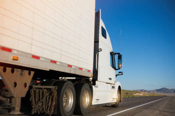 istock Close-up of Container Truck on Highway 1190330770
