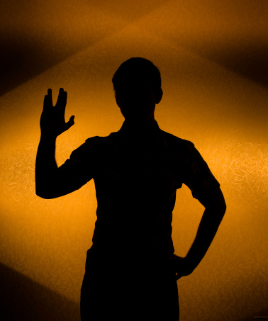 Live long -  silhouette of man with raised hand