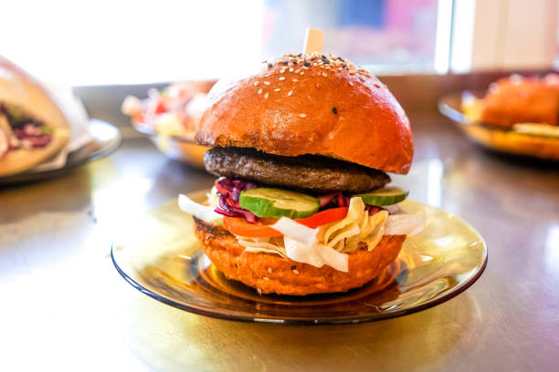 istock Meaty hamburger in a restaurant 1190336274