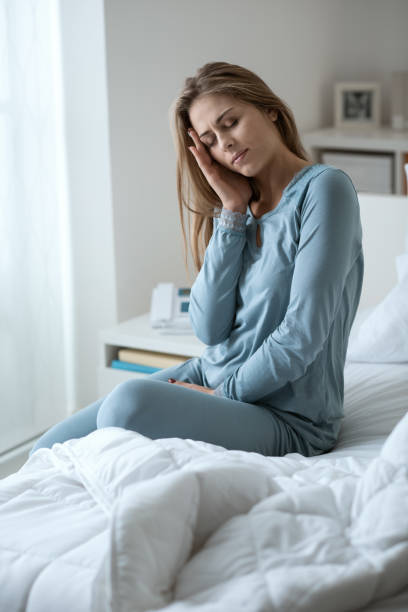 istock Young woman with migraine 1190344558