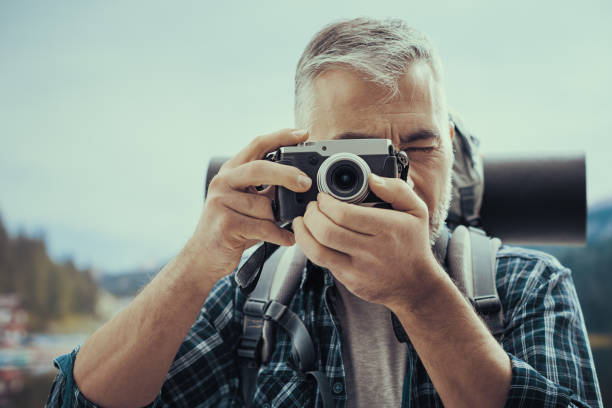 istock Explorer shooting pictures in nature 1190347293