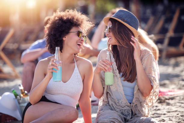 istock Friends enjoying together on the beach 1190348012