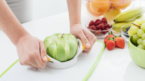 istock Woman preparing an apple 1190349529