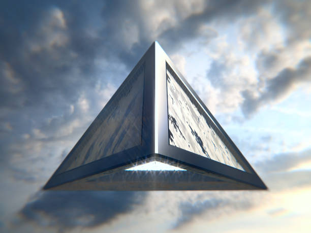 istock Pyramidal UFO flying in the sky 1190349587