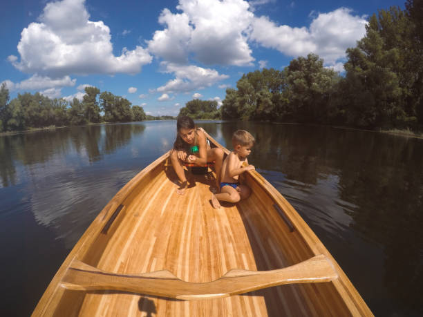 istock Kids in the canoe 1190349807
