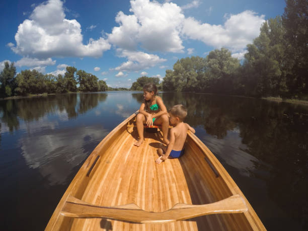 istock Kids in the canoe 1190349834