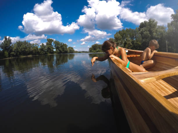 istock Kids in the canoe 1190349907