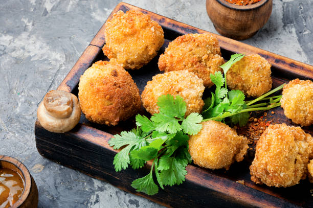 istock Mushrooms in breadcrumbs. 1190351028