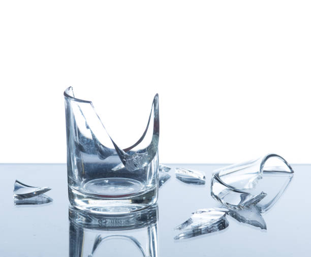 istock broken glass on white background, concept of danger 1190354016