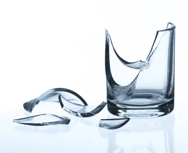 istock broken glass on white background, concept of danger 1190354069