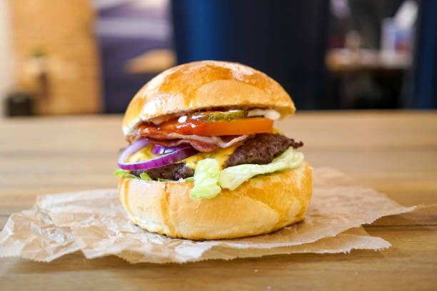 istock Meaty hamburger in a restaurant 1190355286