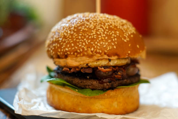 istock Meaty hamburger in a restaurant 1190355287
