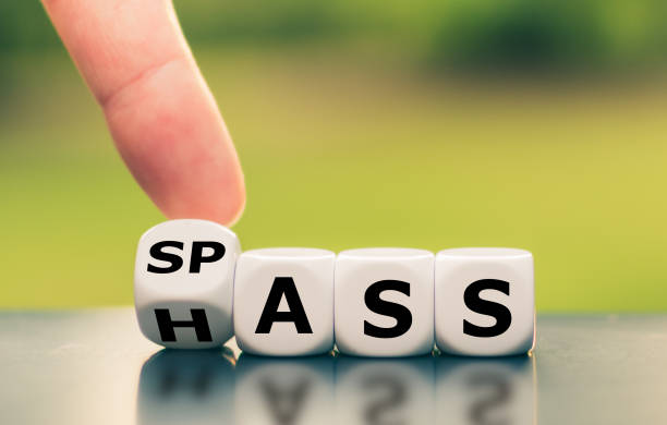 istock Hand turns a dice and changes the German word 