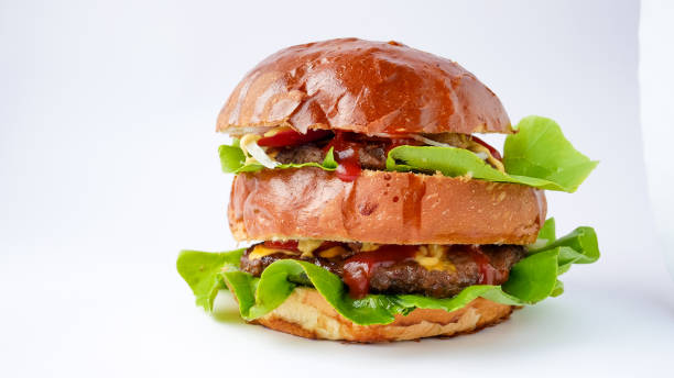 istock Meaty hamburger in a restaurant 1190357211