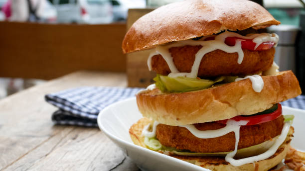 istock Meaty hamburger in a restaurant 1190358863
