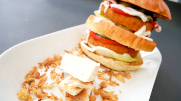 istock Meaty hamburger in a restaurant 1190358982
