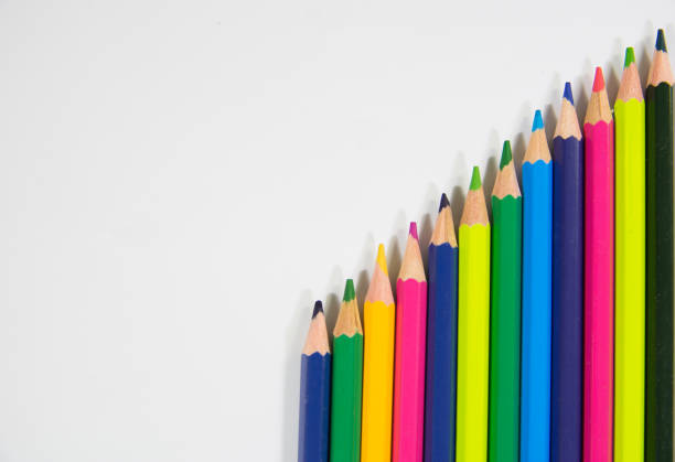 istock Color pencils in shape of progress bar mountain shape on white background diagonal shape 1190365571