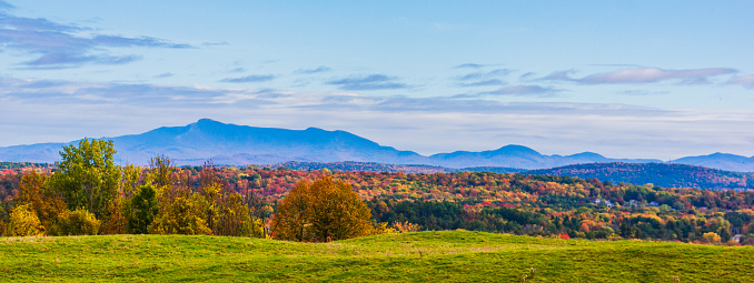 view of Mount Mansfield from Shelburne Farms in autumn