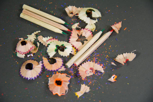 istock random color pencils scrape with wood colors on black background 1190366032
