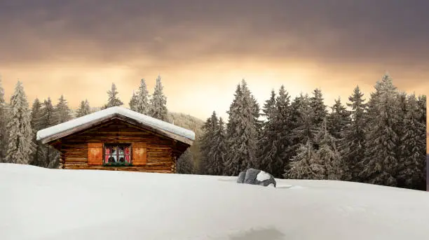 Photo of rustic ski hut in the mountains